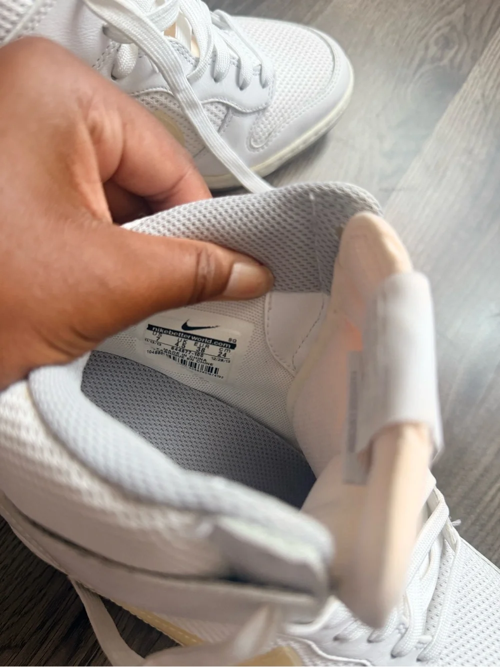 Nike White High-Top Sneakers with Pale Yellow Swoosh